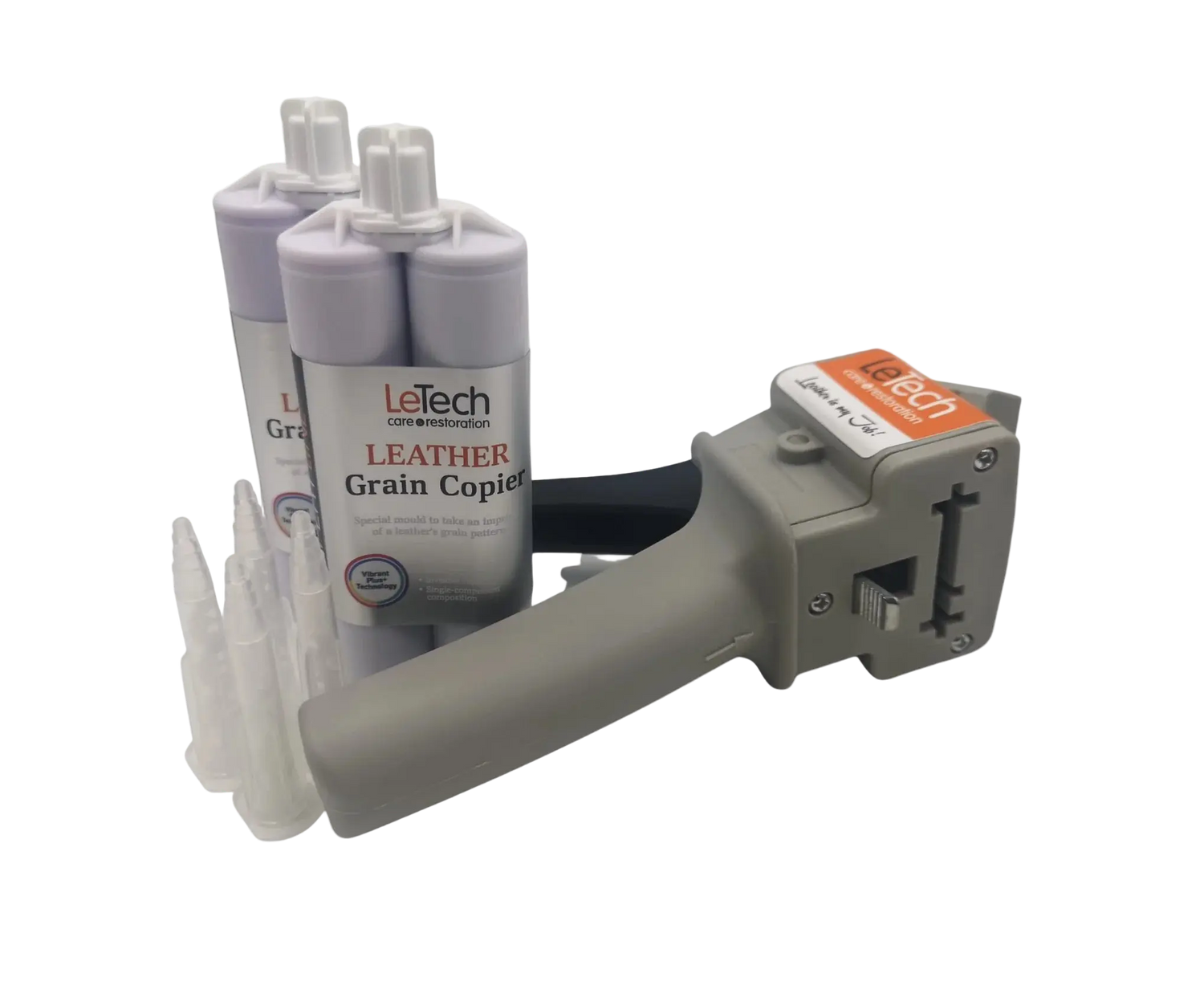 Leather grain copying tool with two bottles on a white background